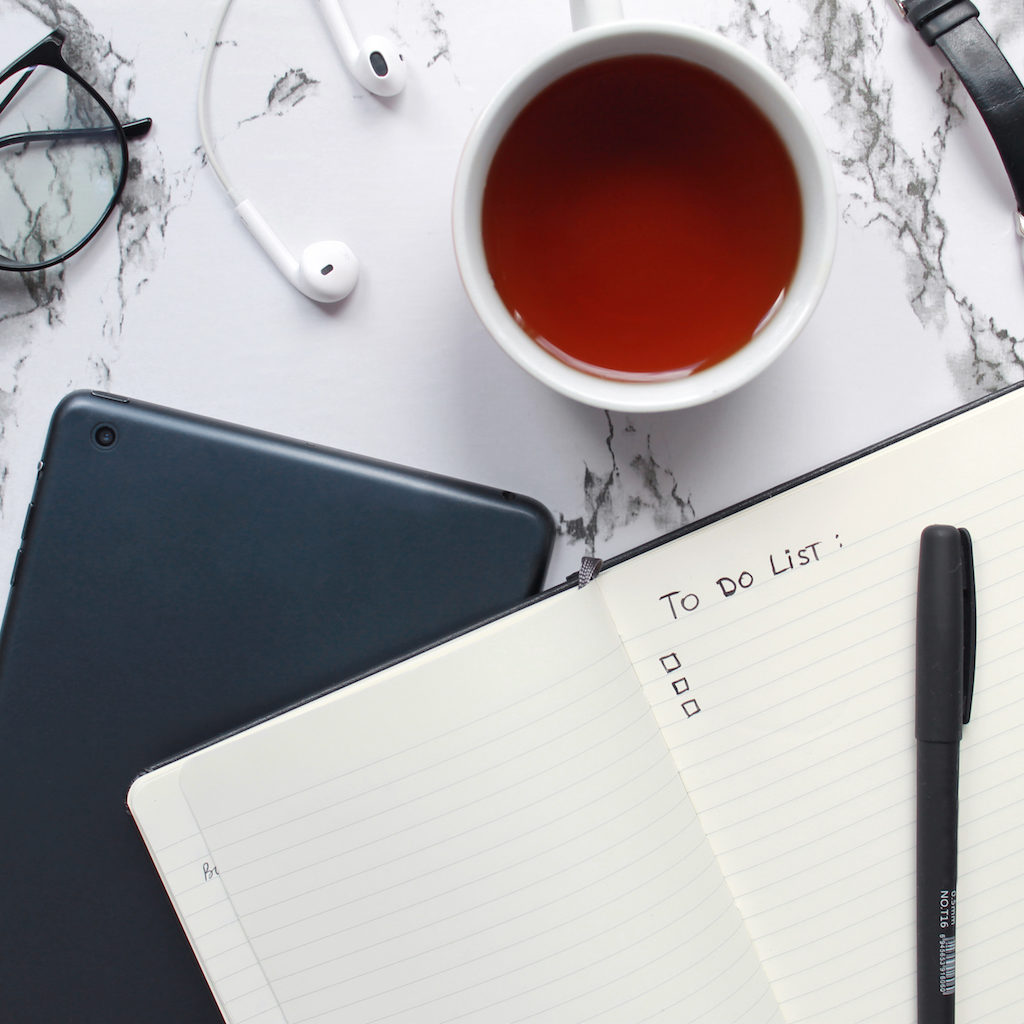 Workspace with coffee and to do list