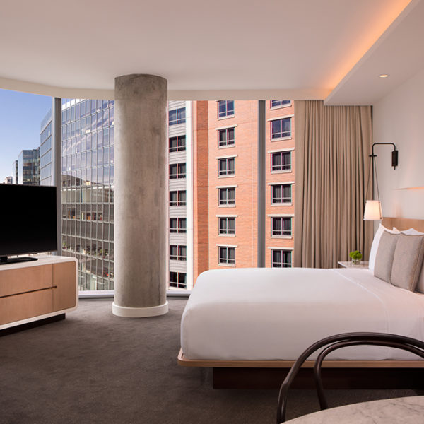 Bed with beautiful view of the city